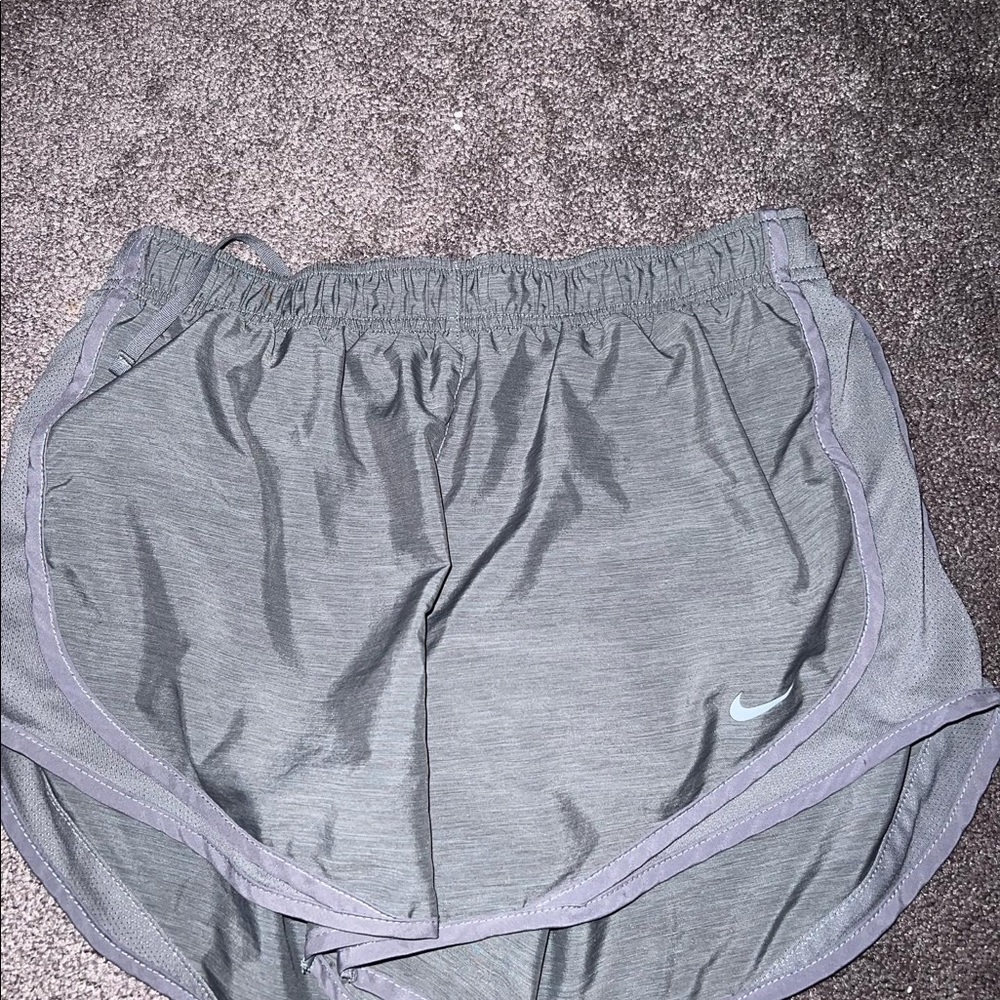 Two pairs of Nike running shorts